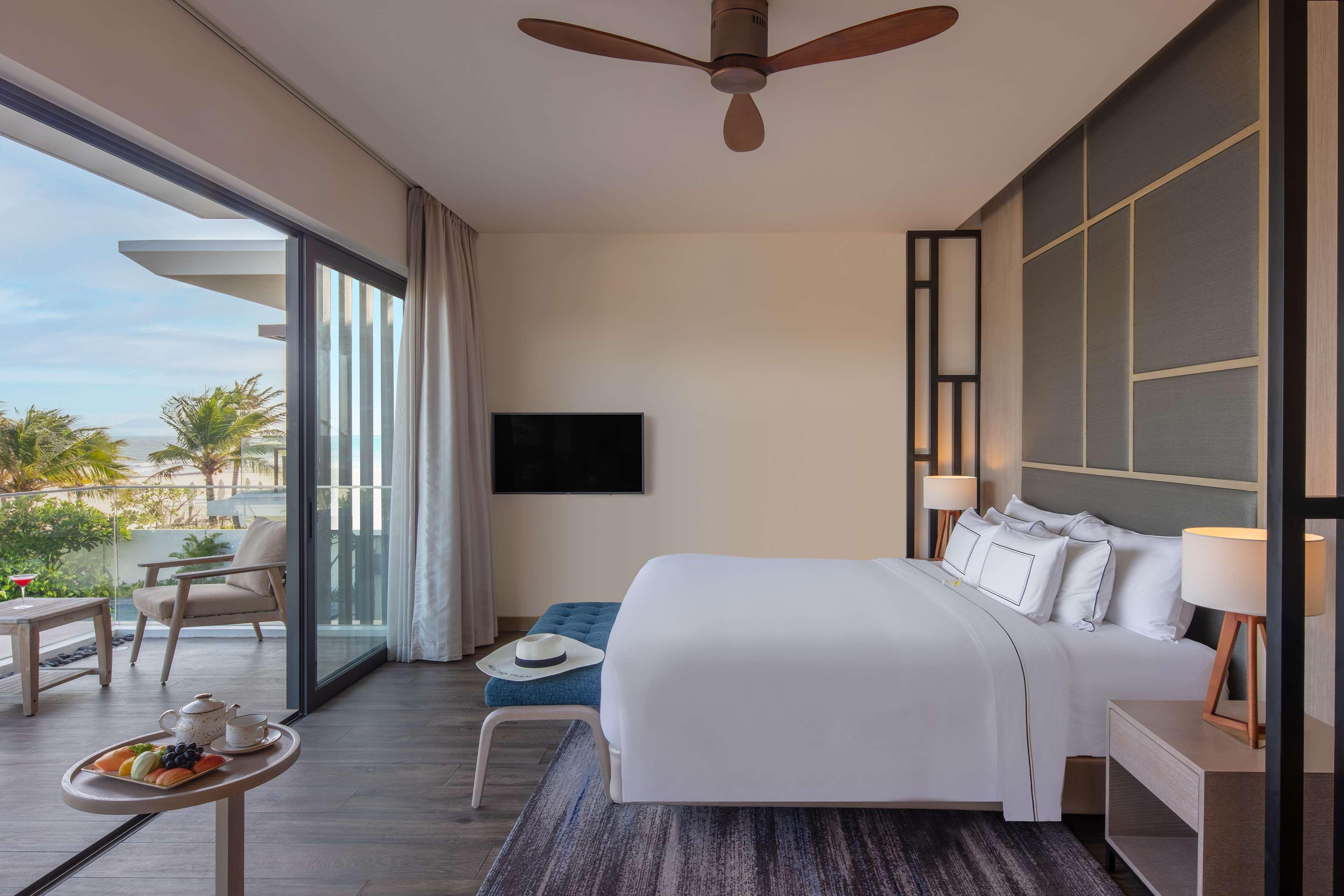 Melia Ho Tram Beach Resort Exterior foto A bedroom at the hotel
